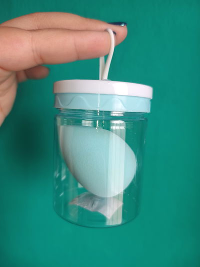 Esponjita con contenedor frasco