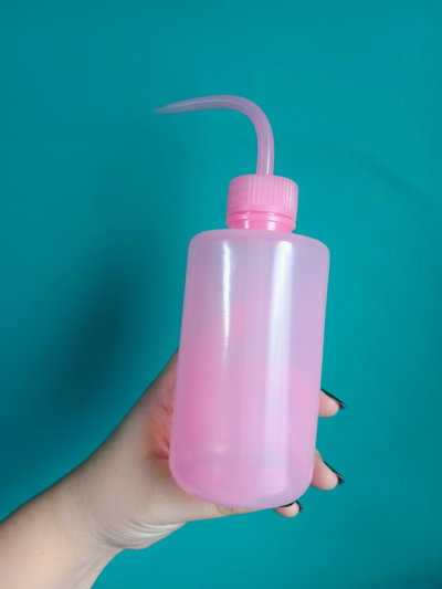 Botella para lavado de pestañas 