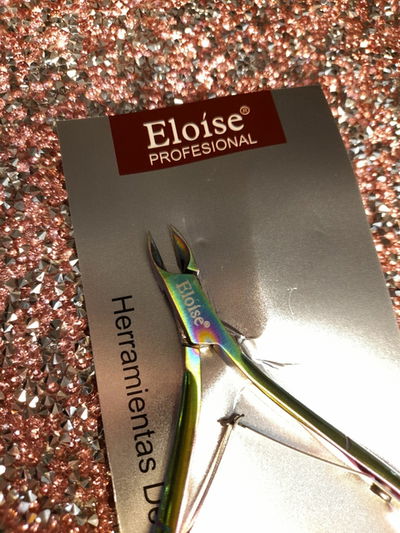 Corta cuticulas Eloise Tornasolado 