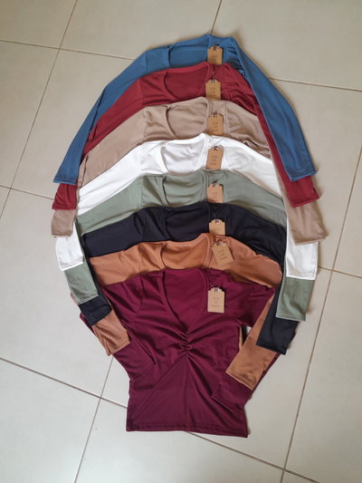 REMERA MANGA LARGA FRUNCE