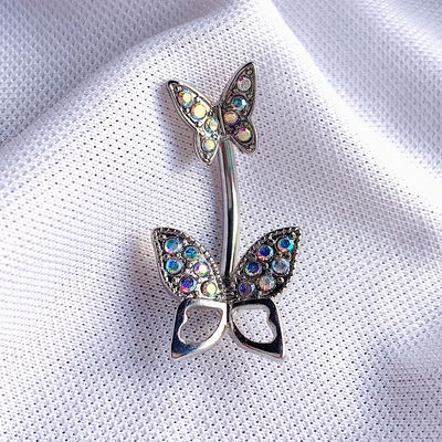 Piercing ombligo: doble mariposa   