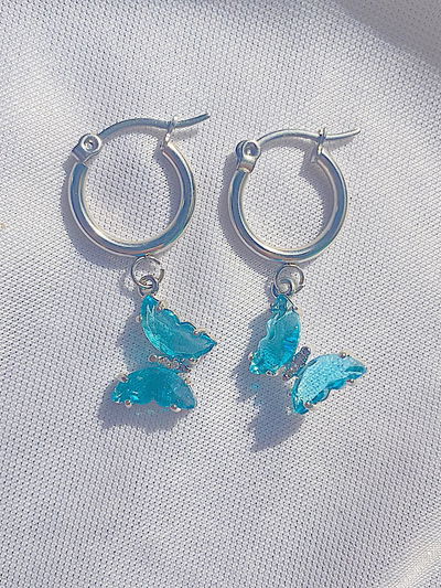 Aros mariposa: celeste