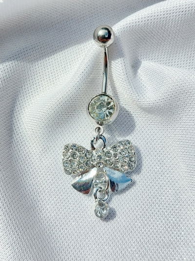 Piercing ombligo moño