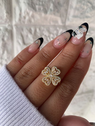 Anillo giratorio - trébol