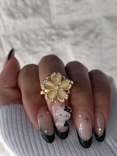 Anillo giratorio - flor