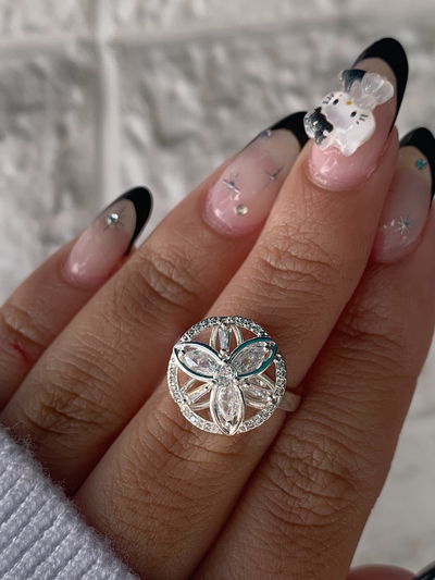 Anillo giratorio - flor briana