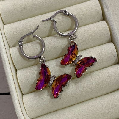 Aros mariposa - fucsia tornasol