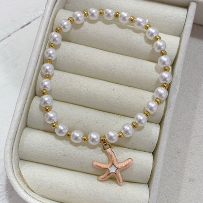 Pulsera estrella rosa