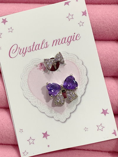 Piercing doble moño: violeta