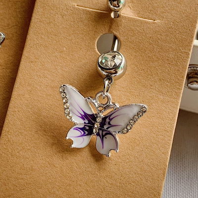 Piercing ombligo butterfly: blanco y violeta
