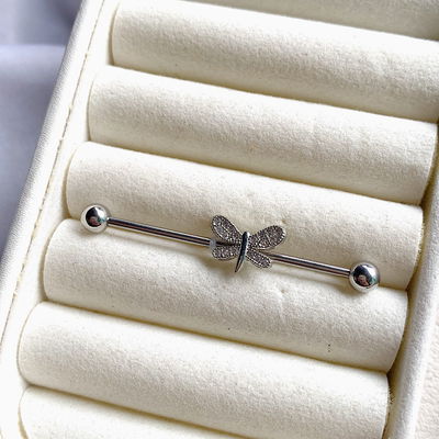 Piercing barra: libélula