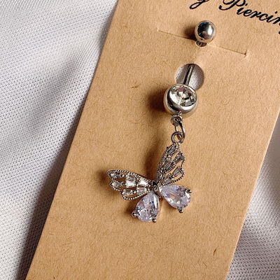 Piercing ombligo mariposa