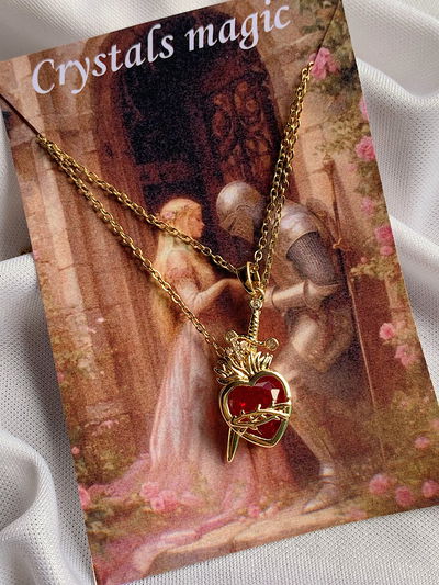 Collar corazón y daga: golden