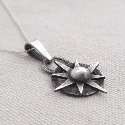 Dije Rosa de los vientos