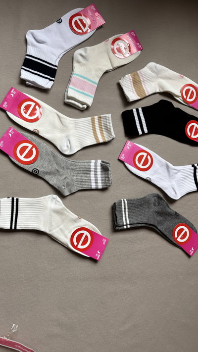 Tenis con líneas de mujer Elemento