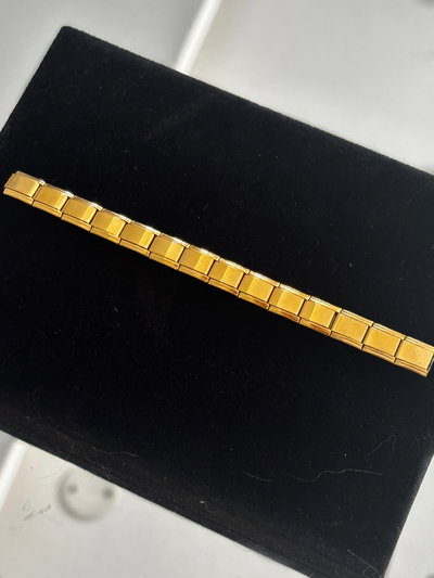 tira de 14 charms (dorado)