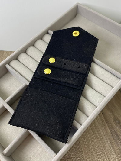 Alajero de cartera 