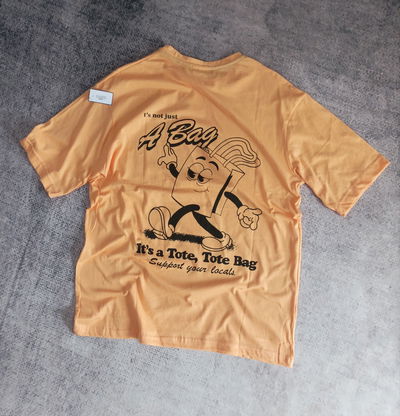 REMERA OVER TOTE BAG