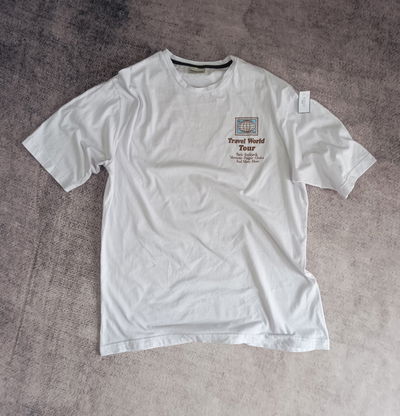 REMERA OVER TRAVEL WORLD