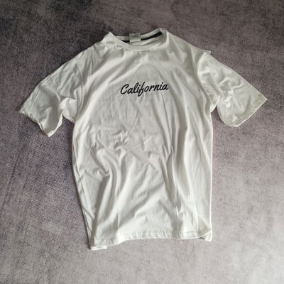 REMERA OVER CALIFORNIA SURF