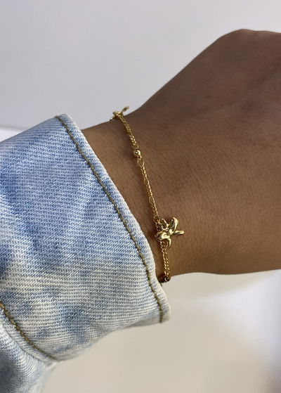 pulsera moños y bolitas 