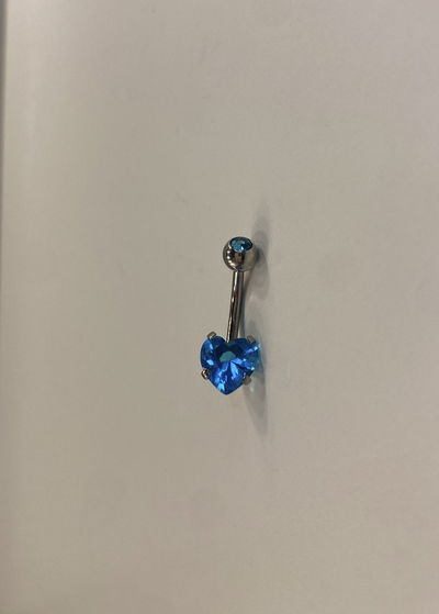 piercing ombligo turquesa 