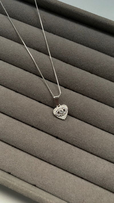 collar corazoncito protect