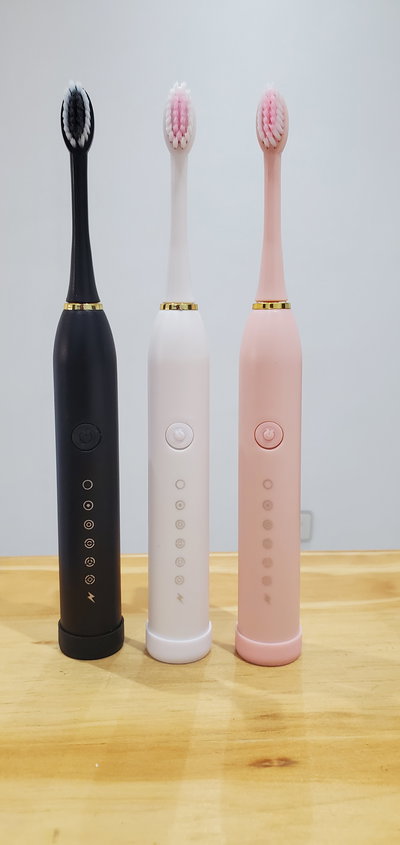 Cepillo de Dientes Eléctrico Recargable + 4 Cepillos