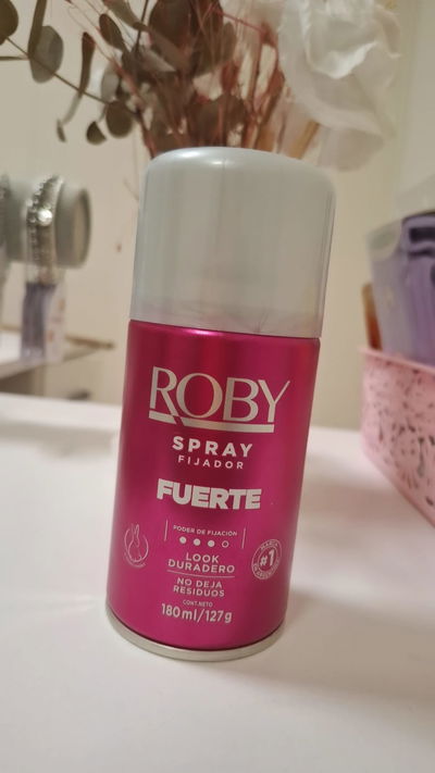 Spray de cabello, fijador fuerte.