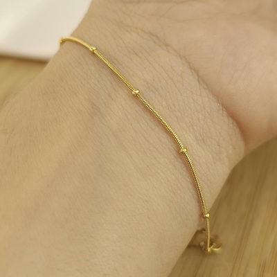 Pulsera cola de ratón con pintitas. 