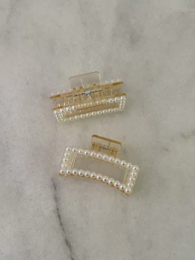 Broche con perlas