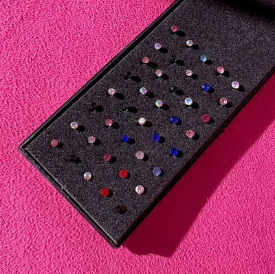 Piercing piedritas de varios colores acero
