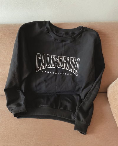 Buzo frizado estampa California
