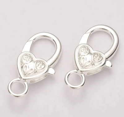  Mosqueton Corazon Liso 27 MM Niquel x 100 unidades