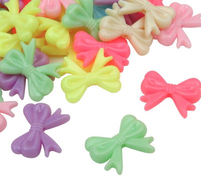 Moños chicos plásticos 500g