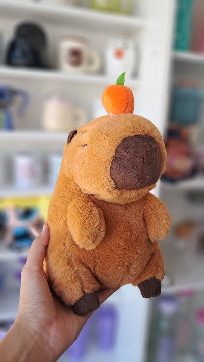 Peluche capybara naranja