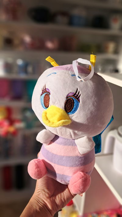 Peluche daisy con alas