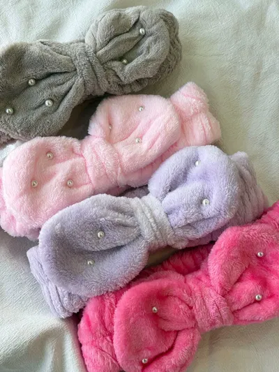 Vincha skin care con moño y perlas