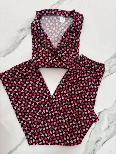 Pijama camisero modal soft corazones fondo negro