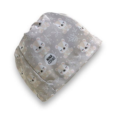 Cofia Nina 846 Koala fondo gris.