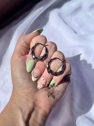 Aro torzado plateado