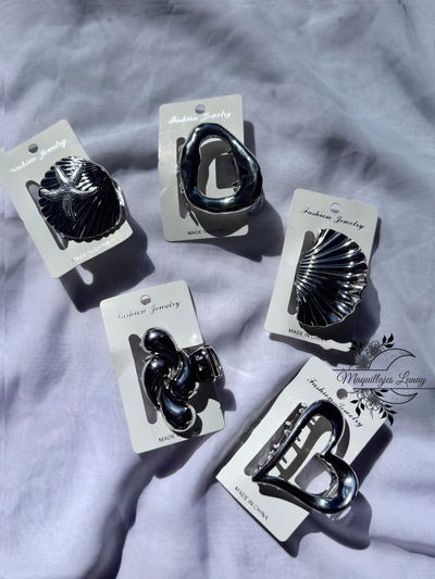 Broche metal plateado