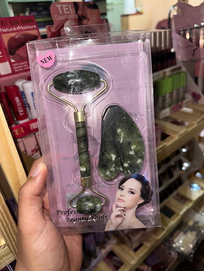 Rodillo masajeador de jade + piedra guasha