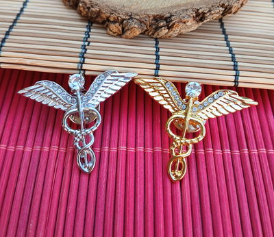 Pin caduceo