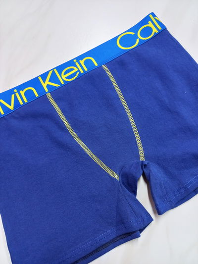 Bóxer Calvin Klein azul y amarillo