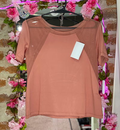 🧡 Remera Deportiva Salmón con Transparencias – Talle M 🧡