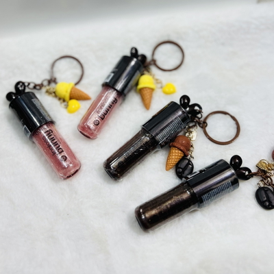 Gloss con destellos y llavero✨-Pink 21