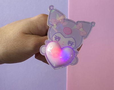 Regla y pulsera con luz Kuromi