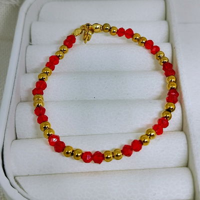 Pulsera cristal bolitas acero dorado