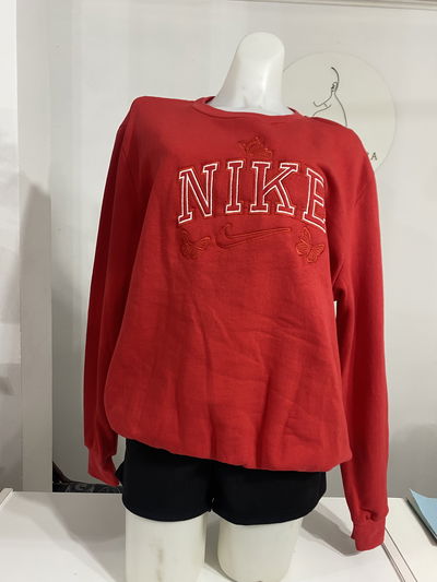 Buzo nike rojo talle L